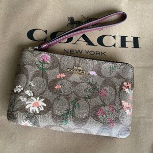 Coach Corner Zip Wristlet In Signature Canvas With Wildflower Print